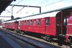 Old passenger coaches photographed in Odense 14. August 2004.  The coaches were built by Scandia, Denmark and were put in service by DSB from 1943 to 1958. The photographed coaches are today owned by the Danish Railwaymuseum. The car behind the lokomotive is Cle 1678, built in 1958. Length 20 220 mm. Weight 37 metric tonnes. 61 seats 2nd class. Withdrawn from service in 1981and taken over by the Danish Railwaymuseum. Photographed in Odense during the railwaymuseum's 50th aniversary celebration of the first My class (from General Motors) being put in service in Denmark.